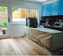 A progress photo of the new kitchen and new floor