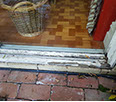 A rotten window sill prior to repair