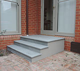 Stairs are complete with bluestone pavers